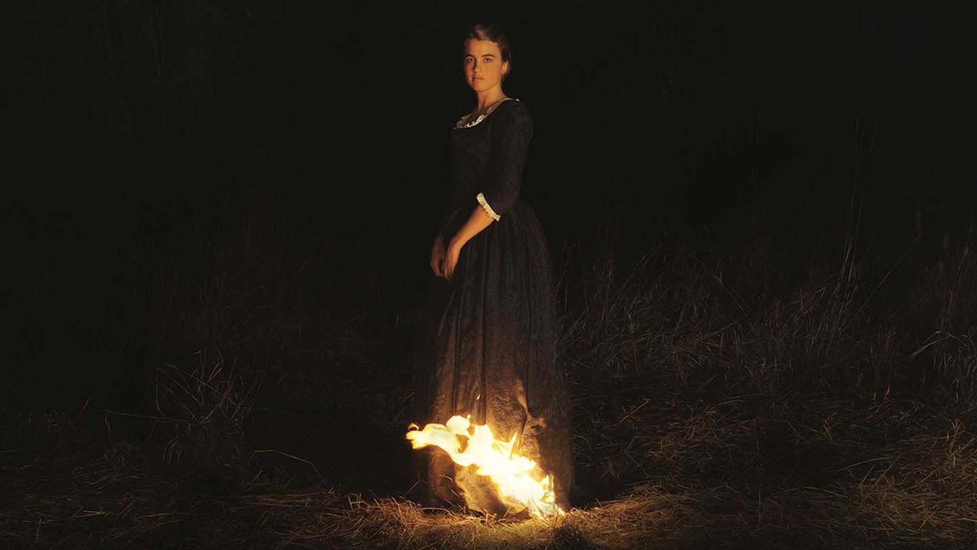 زنی با لباس سیاه بالای آتش در فیلم Portrait of a Lady on Fire